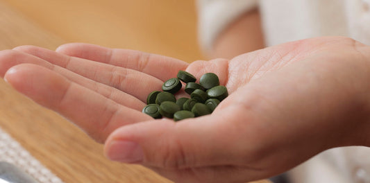 Amount of chlorella tablets in a hand