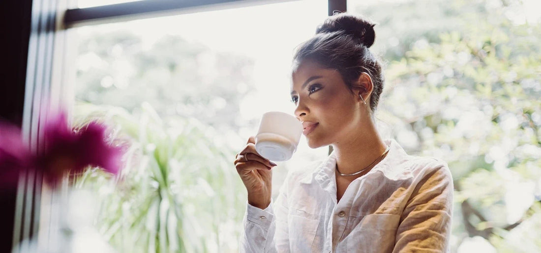 Woman drinking eleuthero extract