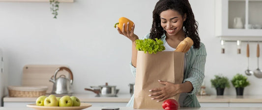 Woman enjoys organic and plant based healthy food