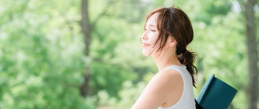 Woman in nature after practicing yoga