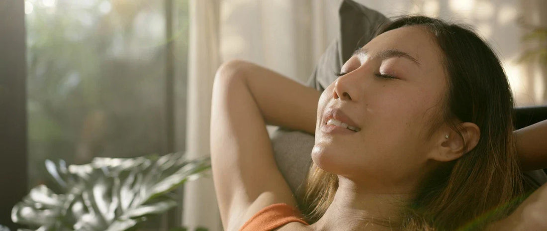 Relaxed woman practicing stress relief 