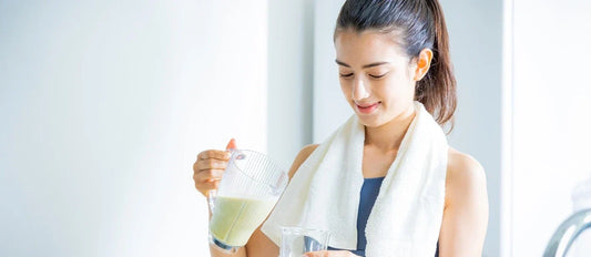 A fitness girl adding a chlorella smoothie to her routine