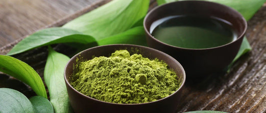 Green tea and powder in a brown bowl